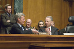 Chuck Grassley giving gavel to Max Baucus by Creator unknown
