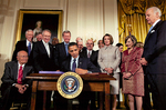 Barack Obama at CHIP reauthorization signing ceremony by Creator unknown