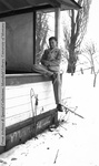 Johnnie on the front porch by Mary Helterline Flynn