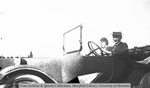 Uncle Jimmy and Aunt Margaret Flynn in a car by Mary Helterline Flynn