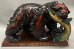 M89-096: Bear with Fish Sculpture